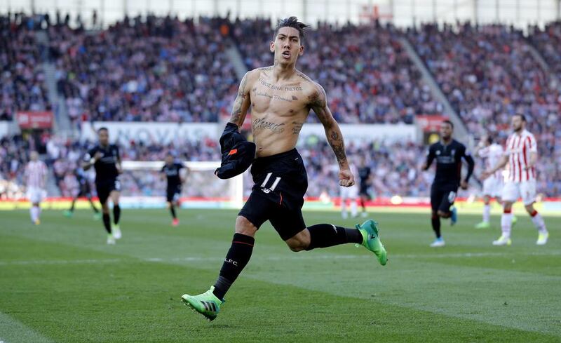 Liverpool's Roberto Firmino celebrates scoring their second goal. Darren Staples / Reuters