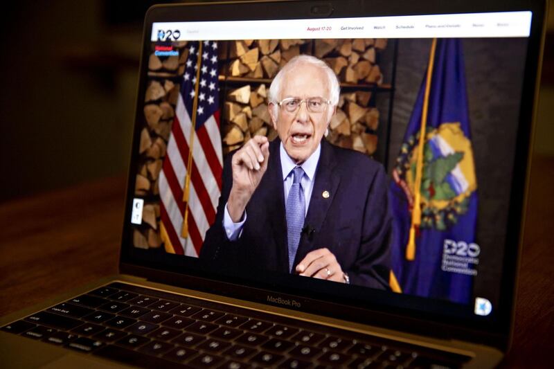 Senator Bernie Sanders, an independent from Vermont, speaks during the virtual Democratic National Convention seen on a laptop computer in Tiskilwa, Illinois, U.S. Bloomberg