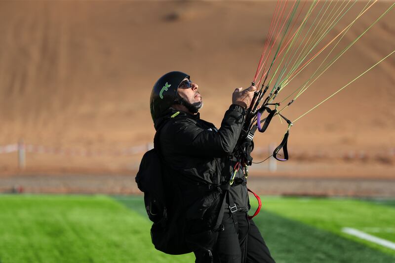 Paraglider Majed Darwish shows his skills at the launch 