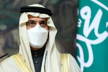 Saudi Foreign Minister Prince Faisal bin Farhan Al-Saud wearing in a face mask to protect himself against coronavirus attend a joint news conference with Russian Foreign Minister Sergey Lavrov following their talks in Moscow, Russia, Thursday, Jan. 14, 2021. (Russian Foreign Ministry Press Service via AP)