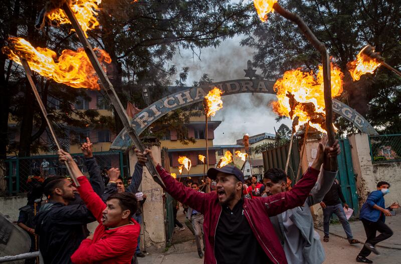 Activists from the Communist Party of Nepal protest against the government's decision to increase fuel prices, in Kathmandu, Nepal. EPA