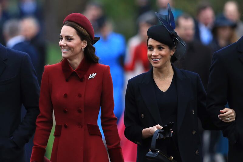 Catherine, Duchess of Cambridge, and Meghan arrive to attend a Christmas Day church service on the Sandringham estate in December 2018. Getty Images