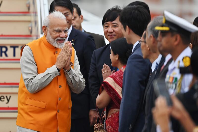 Indian Prime Minister Narendra Modi disembarks.  AFP