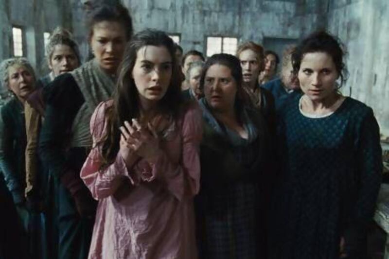 Anne Hathaway, centre, plays Fantine. Courtesy Universal Pictures