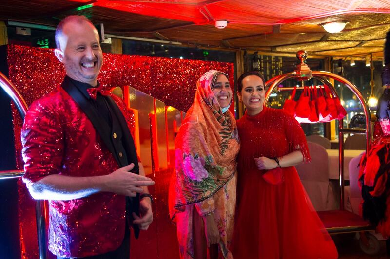 Dubai, United Arab Emirates - Richard the man behind the Big Ticket draw with Bouchra Yamani welcoming winners at the gathering of of Abu Dhabi Big Ticket winners at Alexandra Dhow Cruise, Dubai Marina.  Leslie Pableo for The National for Sarwat Nasir's story