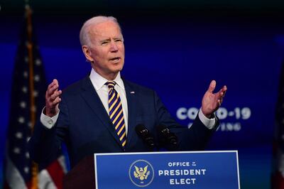 WILMINGTON, DE - DECEMBER 29: U.S. President-elect Joe Biden delivers remarks on the ongoing coronavirus (COVID-19) pandemic at the Queen Theater on December 29, 2020 in Wilmington, Delaware. Biden will be inaugurated as the 46th president in a scaled-down ceremony due to the pandemic in Washington D.C. on January 20, 2021.   Mark Makela/Getty Images/AFP
== FOR NEWSPAPERS, INTERNET, TELCOS & TELEVISION USE ONLY ==
