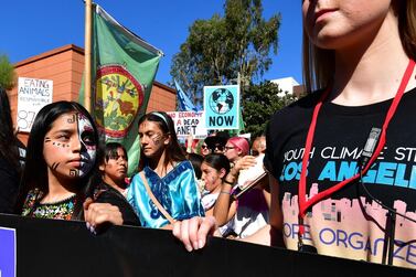 Activists march through downtown Los Angeles in a climate change rally in 2019. AFP