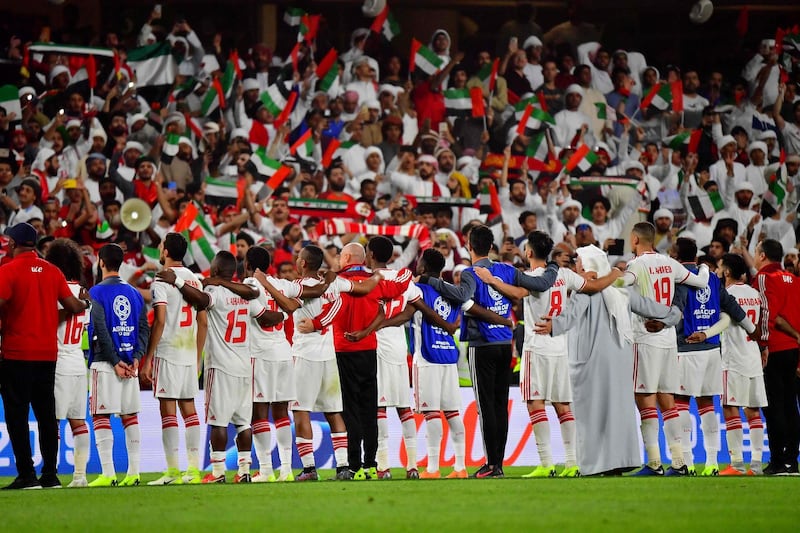 UAE players greet the fans after their victory during the 2019 AFC Asian Cup quarter-final football match between UAE and Australia at Hazza bin Zayed Stadium in Al Ain.  AFP