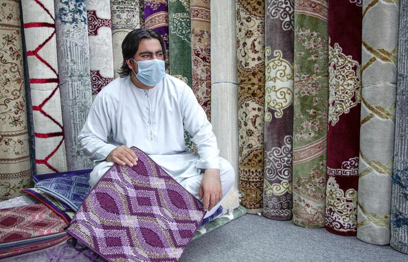 Abu Dhabi, United Arab Emirates, April 18, 2020.  The Carpet Souk at the Zayed Port area.  Lalujan, a carpet salesman is looking forward to Ramadan carpet sales.   The Coronavirus epidemic has greatly impacted their business.Victor Besa / The NationalSection:  NAFor:  Standalone/Stock Images