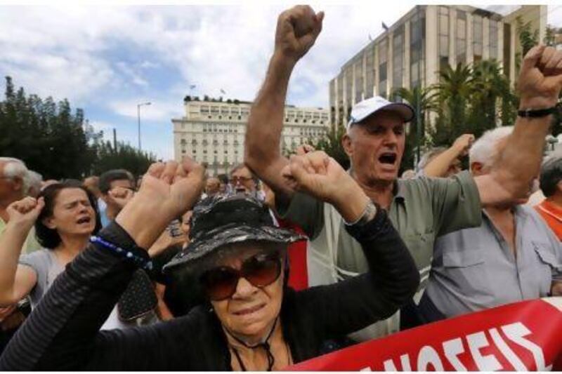 Pensioners march to the EU offices in Athens to protest against EU austerity measures - a day before the German chancellor, Angela Merkel, visits Greece. Yannis Behrakis / Reuters