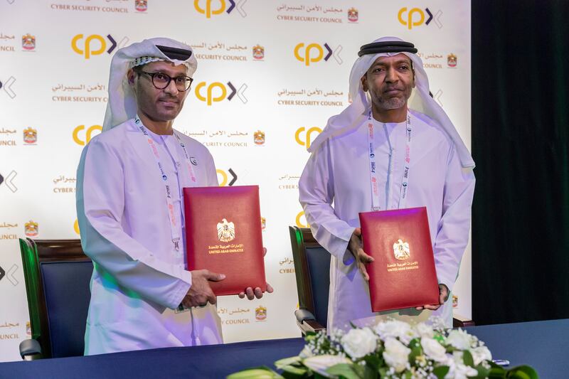 The signing ceremony between the UAE Cybersecurity Council and Cyber Protection X Holding during Gisec Global 2022 in Dubai. Antonie Robertson / The National