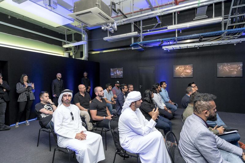 Drivers attend a briefing before heading onto the circuit. Courtesy Abu Dhabi Motors