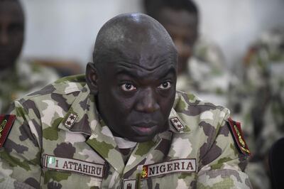 (FILES) In this file photo taken on October 04, 2017 Commander of the Operation Lafiya Dole Major General Ibrahim Attahiru speaks at the army headquarters, in Maiduguri, Borno State in northcentral Nigeria.  Nigeria's top-ranking army commander General Ibrahim Attahiru was killed on on May 21, 2021 when his plane crashed in the country's north, an air force spokesman said. Attahiru was appointed by President Muhammadu Buhari in January in a shakeup of the top military command to better fight surging violence and a more than decade-long jihadist insurgency. / AFP / PIUS UTOMI EKPEI

