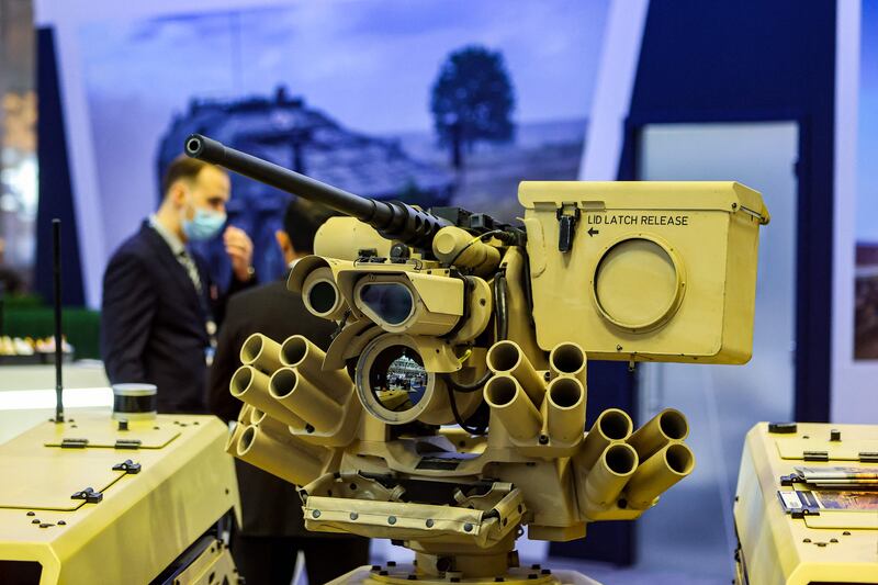 Milrem Robotics' Estonia-built tracked hybrid modular infantry system unmanned ground vehicle, known as THeMIS, at the Doha International Maritime Defence Exhibition in the Qatari capital.