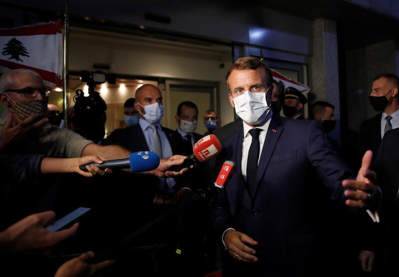 French President Emmanuel Macron speaks to reporters after his meeting with Lebanese President Michel Aoun at Beirut international airport. AP
