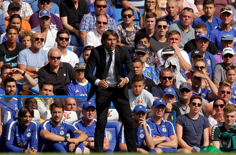 Chelsea's manager Antonio Conte follows the action during the English Premier League soccer match between Chelsea and Everton at Stamford Bridge stadium in London, Sunday, Aug. 27, 2017. (AP Photo/Alastair Grant)