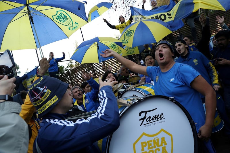 Boca Juniors fans outside the team hotel in Madrid. Reuters