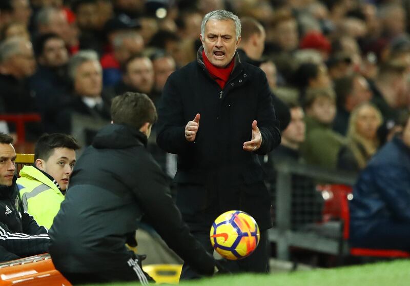 MANCHESTER, ENGLAND - DECEMBER 30:  A ball boy passes the ball to Jose Mourinho, Manager of Manchester United during the Premier League match between Manchester United and Southampton at Old Trafford on December 30, 2017 in Manchester, England.  (Photo by Clive Mason/Getty Images)