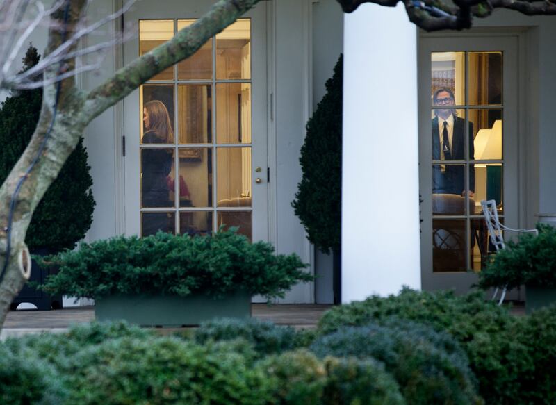 Angelina Jolie, left, and Brad Pitt, right, are seen the Oval Office of the White House after a meeting on January 11, 2012. Getty Images