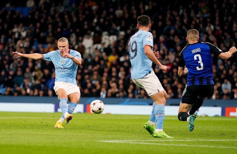 Erling Haaland scores the opening goal. PA