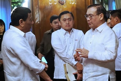 President Rodrigo Roa Duterte chats with Foreign Affairs Secretary Teodoro Locsin Jr. on the sidelines of Japan House of Councillors President Chuichi Date's courtesy call on the President at the Malacañan Palace on January 8, 2018. RENE LUMAWAG/PRESIDENTIAL PHOTO