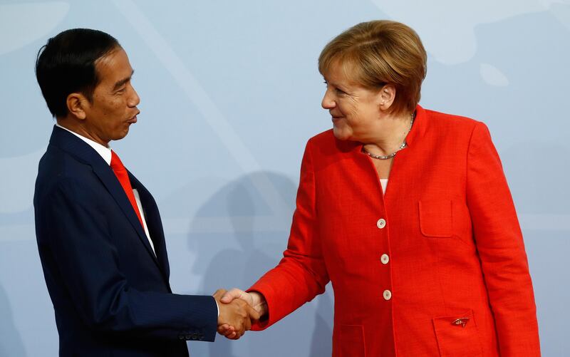 German Chancellor Angela Merkel welcomes Indonesia's president Joko Widodo. Odd Andersen / AFP Photo