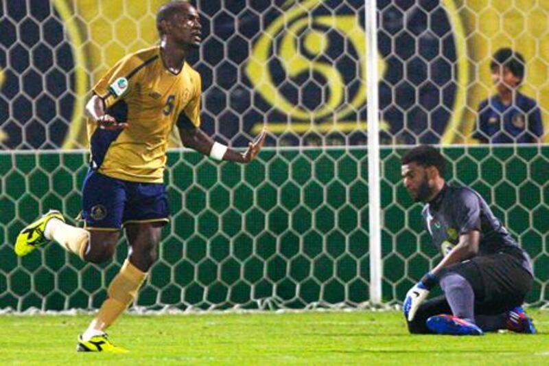 Simon Pierre Feindouno celebrates scoring for Dubai against Al Wasl - but is now hunting for a new club.