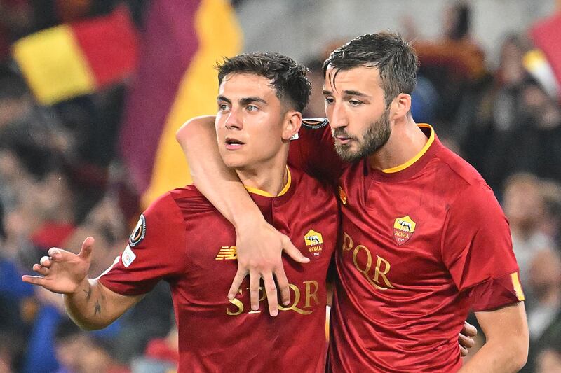 AS Roma's Paulo Dybala, left, and Bryan Cristante celebrate. AFP