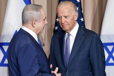 Israeli Prime Minister Benjamin Netanyahu, left, and then US vice president Joe Biden meet on the sidelines of the World Economic Forum in Davos, in 2016. AP Photo