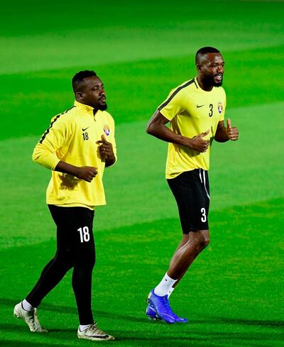 Al Ain players Ibrahim Diaky, left, and a teammate take part in training. Courtesy Al Ain FC