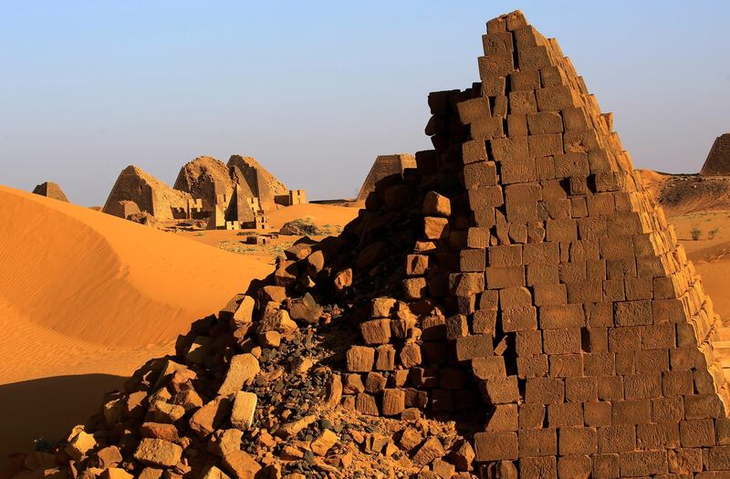 Creeping desert sands surround the Royal Cemeteries of Meroe Pyramids in Begrawiya at River Nile State, Sudan. Reuters