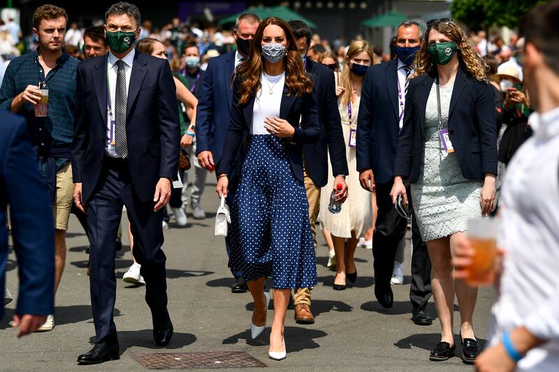 Catherine, Duchess of Cambridge walks at the All England Lawn Tennis and Croquet Club as she attends the Wimbledon Championships in Wimbledon, Britain.