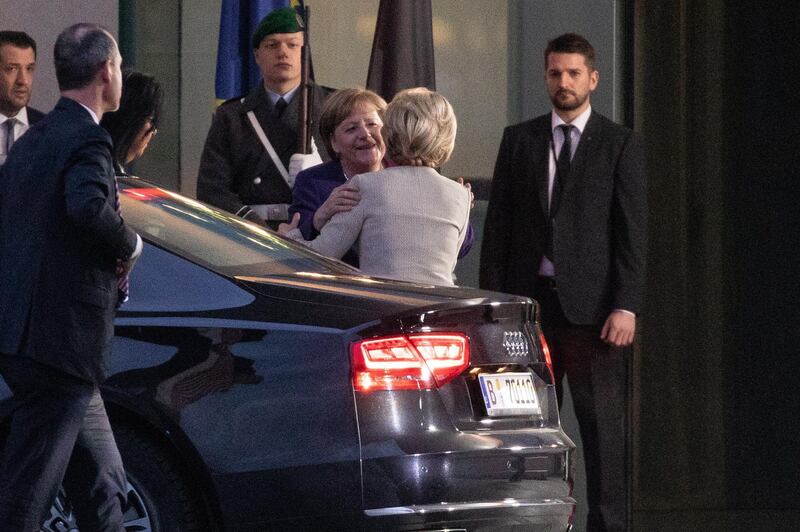 German Chancellor Angela Merkel greets EU Commission President Ursula Von der Leyen upon her arrival at the Federal Chancellery in Berlin.  EPA