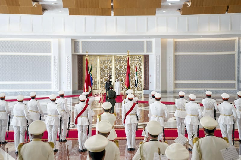 ABU DHABI, UNITED ARAB EMIRATES - July 13, 2018: HH Sheikh Mohamed bin Zayed Al Nahyan Crown Prince of Abu Dhabi Deputy Supreme Commander of the UAE Armed Forces (center R) and HE Cyril Ramaphosa, President of South Africa (center L), stand for the UAE national anthem during a reception at the Presidential Airport.

( Rashed Al Mansoori / Crown Prince Court - Abu Dhabi )
---