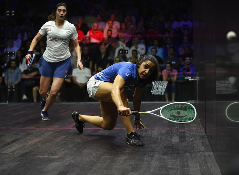 DUBAI, UNITED ARAB EMIRATES - JUNE 09:  Nour El Sherbini of Egypt (L) competes against Raneem El Welily of Egypt (R) during the women's final match of the PSA Dubai World Series Finals 2018 at Emirates Golf Club on June 9, 2018 in Dubai, United Arab Emirates.  (Photo by Tom Dulat/Getty Images)