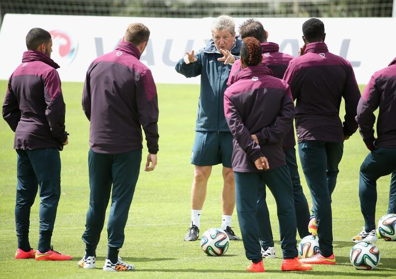 England manager Roy Hodgson talks to the players during a 2014 World Cup training session in Portugal on Wednesday. Richard Heathcote / Getty Images / May 21, 2014