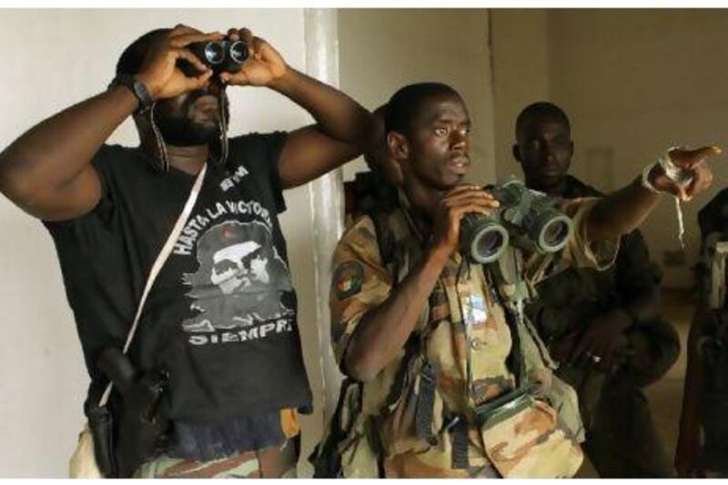 Forces loyal to Alassane Ouattara have surrounded the residence of Laurent Gbagbo, but the former president refuses to surrender.