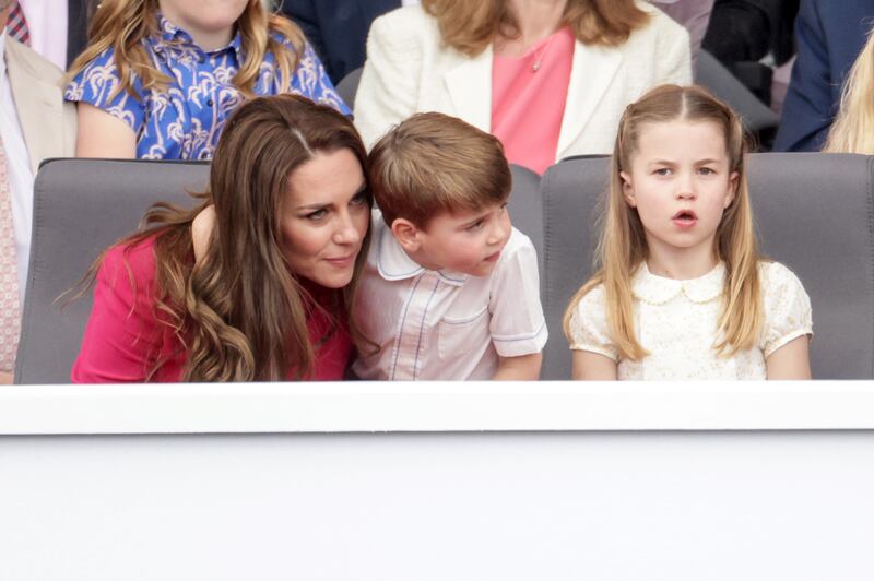 Kate, Louis and Charlotte during the queen's platinum jubilee pageant in front of Buckingham Palace. PA