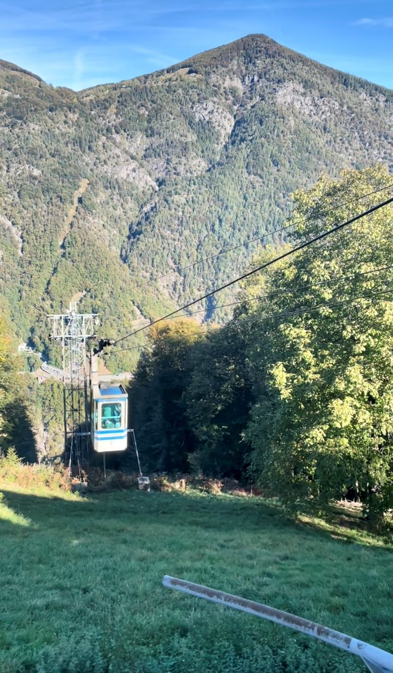 The tiny cable car soars over green valleys. Hayley Skirka / The National