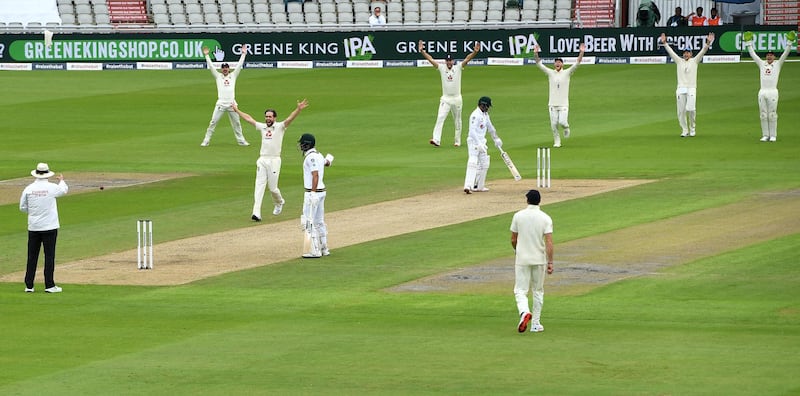 Chris Woakes successfully appeals for the wicket of Azhar Ali. Getty