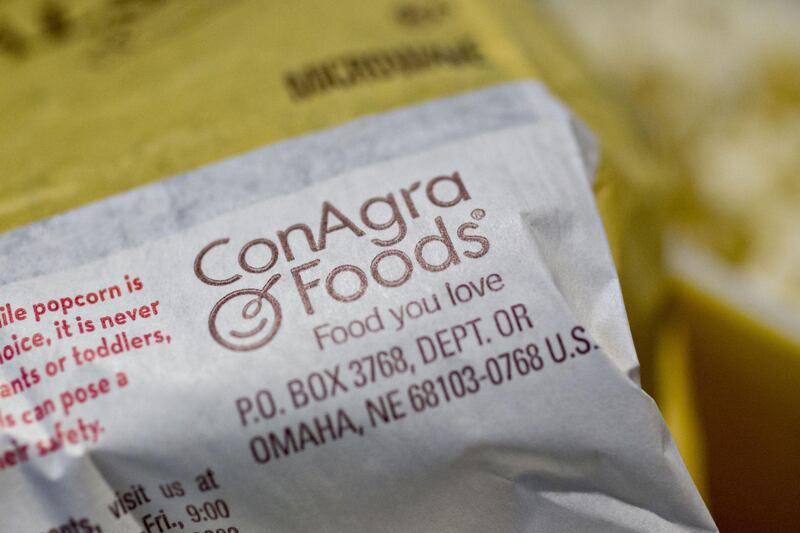 ConAgra Brands Inc. signage is seen on a bag of popcorn displayed for a photograph in Tiskilwa, Illinois, U.S., on Sunday, Sept. 24, 2017. ConAgra Brands Inc. is scheduled to release earnings on September 28. Photographer: Daniel Acker/Bloomberg