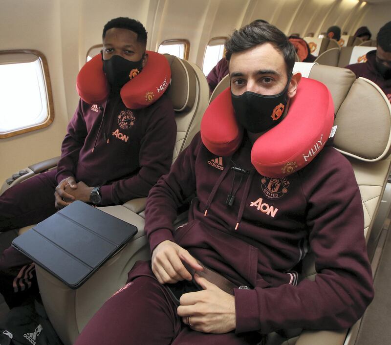 MANCHESTER, ENGLAND - FEBRUARY 17: (EXCLUSIVE COVERAGE)  Fred and Bruno Fernandes of Manchester United poses on the plane ahead of their flight to Turin at Manchester Airport on February 17, 2021 in Manchester, England. (Photo by Matthew Peters/Manchester United via Getty Images)