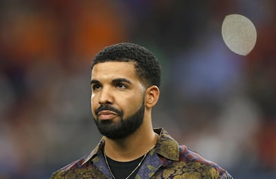 (FILES) In this file photo taken on July 20, 2017 rapper Drake looks on prior to the International Champions Cup soccer match between Manchester City against Manchester United at NRG Stadium in Houston, Texas. Music's biggest stars will gather in Los Angeles on Sunday for the Grammy Awards, and this year observers are hoping the hip-hop and women artists leading the pack will get their due. The industry's annual gala draws eye rolls every year from critics who say the winners are too white and too male, but for the second consecutive year black hip-hop artists dominated the nominations across the board.

 / AFP / AARON M. SPRECHER
