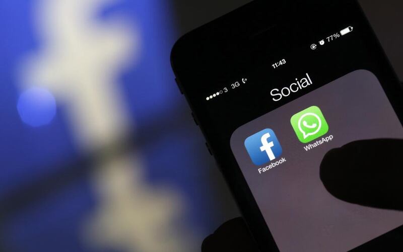 Social media such as WhatsApp and Facebook liaised to expand their reach among users on mobile devices. Chris Ratcliffe / Bloomberg