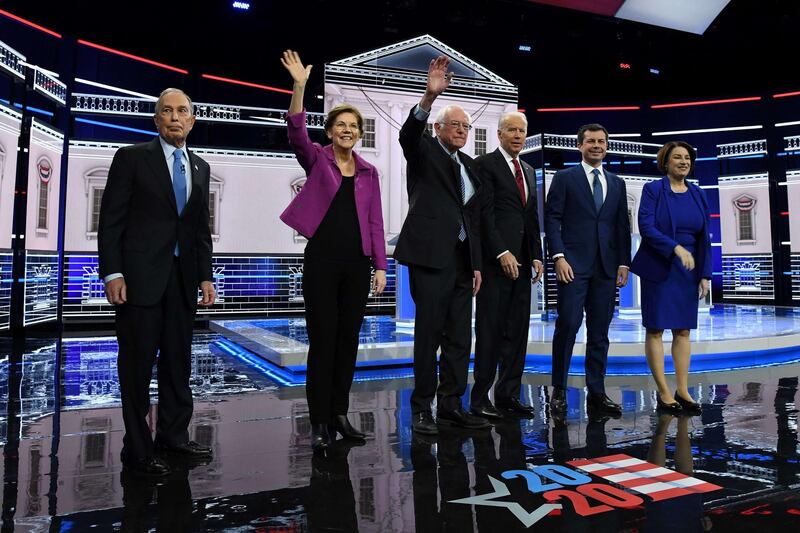 LAS VEGAS, NEVADA - FEBRUARY 19: Democratic presidential candidates (L-R) former New York City Mayor Mike Bloomberg, Sen. Elizabeth Warren (D-MA), Sen. Bernie Sanders (I-VT), former Vice President Joe Biden, former South Bend, Indiana Mayor Pete Buttigieg, and Sen. Amy Klobuchar (D-MN) arrive on stage for the Democratic presidential primary debate at Paris Las Vegas on February 19, 2020 in Las Vegas, Nevada. Six candidates qualified for the third Democratic presidential primary debate of 2020, which comes just days before the Nevada caucuses on February 22.   Ethan Miller/Getty Images/AFP
== FOR NEWSPAPERS, INTERNET, TELCOS & TELEVISION USE ONLY ==
