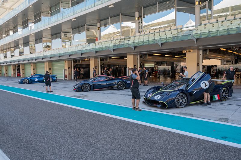 Mechanics prepare the cars