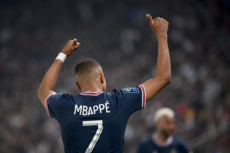 Kylian Mbappe celebrates after scoring his third goal against Metz at the Parc des Princes. AFP