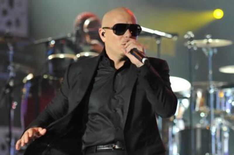 Pitbull, American rapper pop singer performs during the 11th edition of the Mawazine international music festival "World Rhythms" in Rabat on May 19 , 2012.    AFP PHOTO / FADEL SENNA