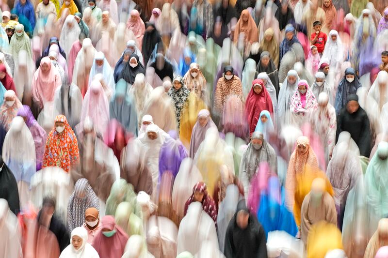 Muslim women perform the evening taraweeh prayer on the first day of Ramadan in Jakarta, Indonesia. AP