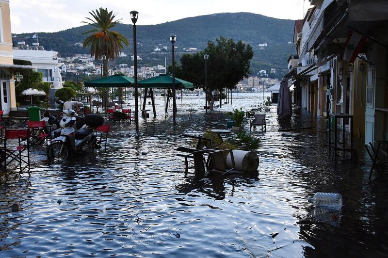 Seawater covers floods a square after an earthquake at the port of Vathi on the eastern Aegean island of Samos, Greece. AP Photo